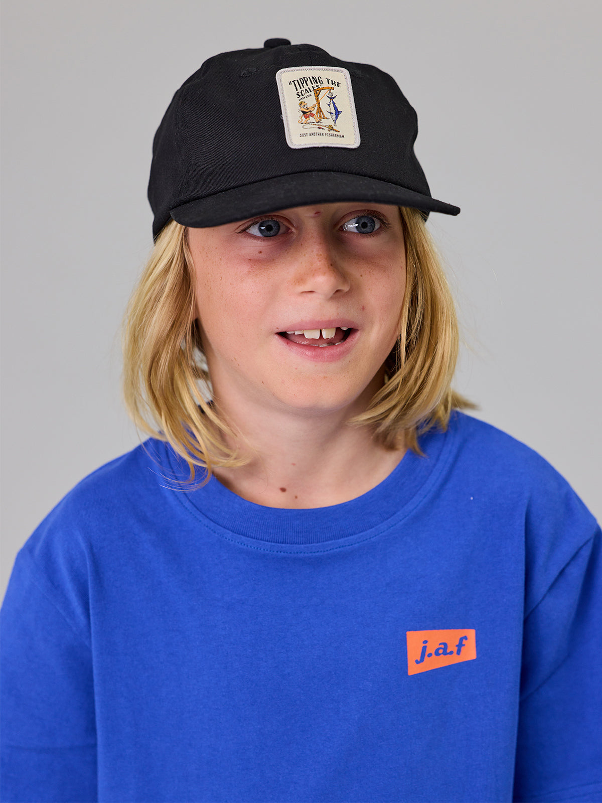 Just Another Fisherman Mini Tipping The Scales Keep Cap Black