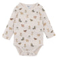 Baby bodysuit with dog pattern on a white background